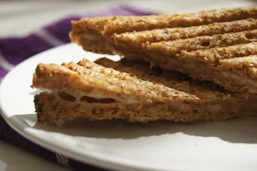 Sliced grilled cheese sandwich